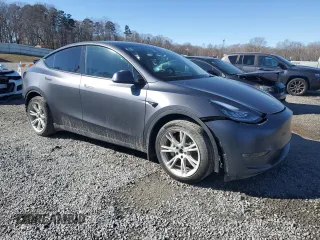 2022 Tesla Model Y Long Range z VIN 7SAYGAEE5NF430627, wystawiony jako Copart lot #89192355 z przebiegiem 35 107 mil mil oraz Szkody całkowita. Historia ofert i sprzedaży dostępna na DreamBid. Obrazek 4.