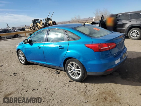 2016 Ford Focus SE with VIN 1FADP3F23GL212607, listed as a Copart auction lot 86732334 with 36,607 mi miles and Salvage title. Bid and sale history available at DreamBid. Image 2.
