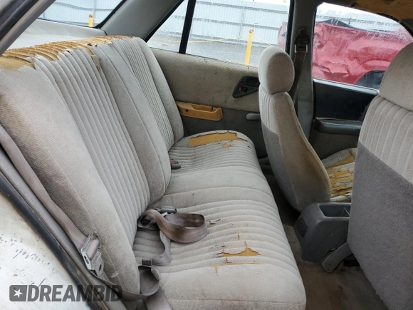 1993 Chevrolet Corsica LT z VIN 1G1LT53T4PY262289, wystawiony jako Copart lot #81687643 z przebiegiem 236 597 mil mil oraz Czysty tytuł • Clean title. Historia ofert i sprzedaży dostępna na DreamBid. Obrazek 10.