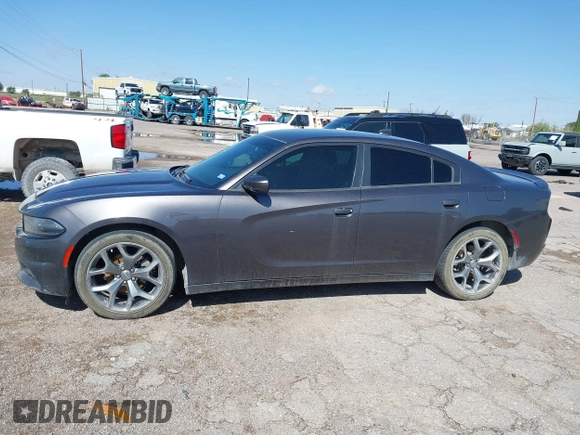 2015 Dodge Charger SXT with VIN 2C3CDXHG9FH825135, listed as a IAAI auction lot 42172793 with 169,324 mi miles and . Bid and sale history available at DreamBid. Image 14.