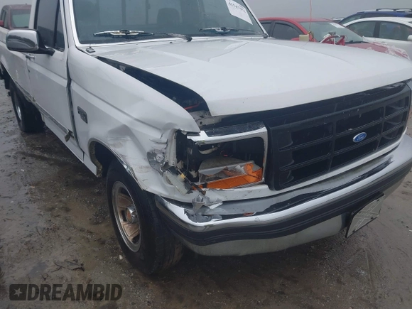 1994 Ford F-150 with VIN 1FTEF15N0RNA67826, listed as a IAAI auction lot 41547971 with 233,713 mi miles. Bid and sale history available at carsss.com. Image 6.