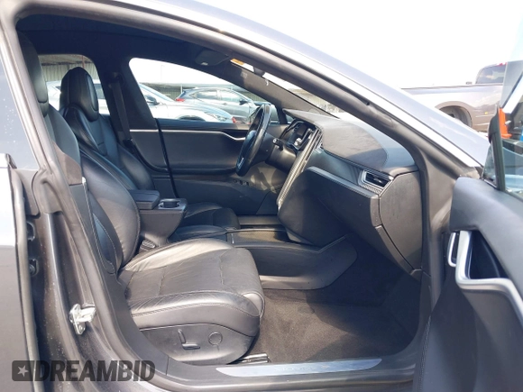 2017 Tesla Model S 100D with VIN 5YJSA1E29HF204881, listed as a IAAI auction lot 41785767 with 146,523 mi miles and . Bid and sale history available at DreamBid. Image 5.