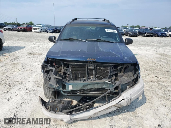 2001 Jeep Grand Cherokee Laredo with VIN 1J4GX48S11C729366, listed as a Copart auction lot 62524565 with 373,749 mi miles and Salvage title. Bid and sale history available at DreamBid. Image 5.
