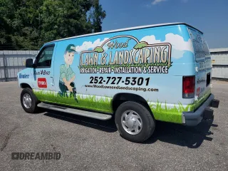 2014 Ford Econoline Cargo Commercial with VIN 1FTNE2EWXEDA53837, listed as a Copart auction lot 61743185 with 158,968 mi miles and Salvage title. Bid and sale history available at DreamBid. Image 2.