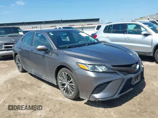 2019 Toyota Camry LE z VIN 4T1B11HK0KU787945, wystawiony jako IAAI lot #42273701 z przebiegiem 147 975 mil mil oraz . Historia ofert i sprzedaży dostępna na DreamBid. Obrazek 1.