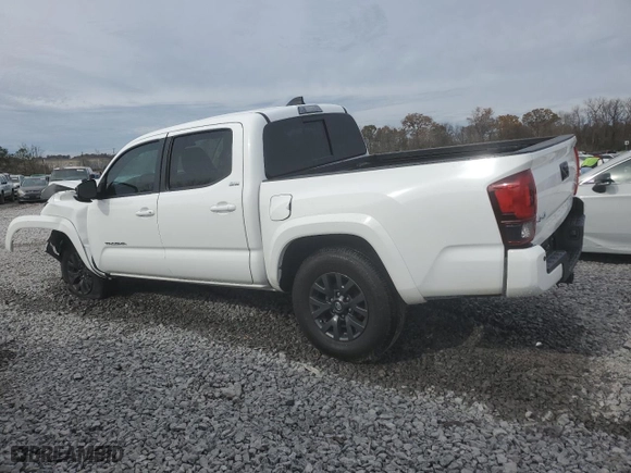 2023 Toyota Tacoma 4WD SR with VIN 3TMCZ5AN2PM593958, listed as a Copart auction lot 84627294 with 18,928 mi miles and Salvage Title. Bid and sale history available at carsss.com. Image 2.