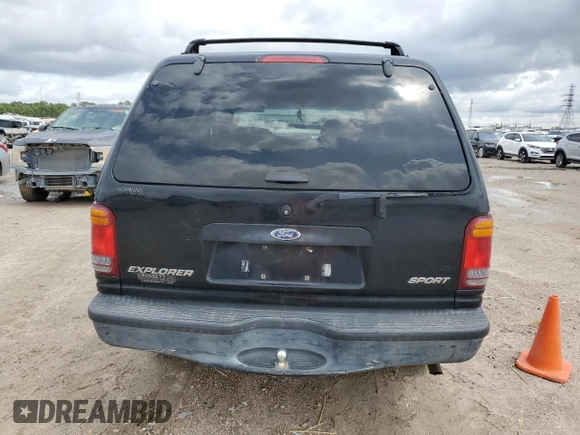 1999 Ford Explorer Sport z VIN 1FMYU22X9XUC03819, wystawiony jako Copart lot #69840564 z przebiegiem 214 315 mil mil oraz Szkoda całkowita • Salvage title. Historia ofert i sprzedaży dostępna na DreamBid. Obrazek 6.