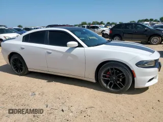 2015 Dodge Charger SXT with VIN 2C3CDXHG0FH862901, listed as a Copart auction lot 61402225 with 128,926 mi miles and Salvage title. Bid and sale history available at DreamBid. Image 4.