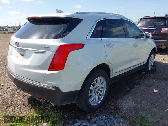 2017 Cadillac XT5 FWD with VIN 1GYKNARSXHZ192288, listed as a IAAI auction lot 42550286 with 115,570 mi miles and . Bid and sale history available at DreamBid. Image 4.