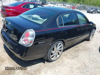 2006 Nissan Altima 2.5 with VIN 1N4AL11D96N334595, listed as a IAAI auction lot 42004783 with 166,683 mi miles. Bid and sale history available at carsss.com. Image 4.