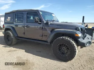 2020 Jeep Wrangler Unlimited Willys with VIN 1C4HJXDG5LW246978, listed as a Copart auction lot 52930515 with 117,020 mi miles and Salvage title. Bid and sale history available at DreamBid. Image 4.
