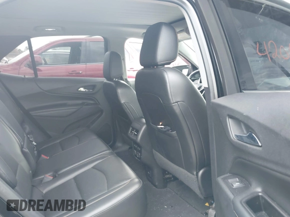 2018 Chevrolet Equinox Premier with VIN 2GNAXWEX6J6302935, listed as a IAAI auction lot 42065883 with 61,983 mi miles and . Bid and sale history available at carsss.com. Image 8.