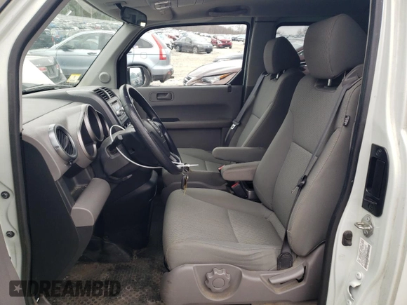 2011 Honda Element EX with VIN 5J6YH2H77BL003367, listed as a Copart auction lot 52401305 with 215,346 mi miles and Clean Title. Bid and sale history available at DreamBid. Image 7.