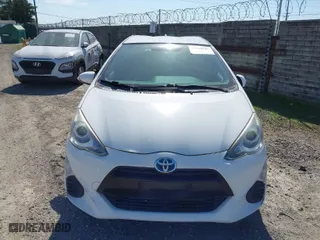 2016 Toyota Prius c One with VIN JTDKDTB3XG1121645, listed as a IAAI auction lot 41710567 with 137,356 mi miles. Bid and sale history available at carsss.com. Image 12.