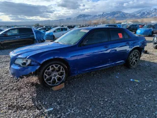 2018 Chrysler 300 with VIN 2C3CCAGG9JH267569, listed as a Copart auction lot 85065474 with 70,057 mi miles and Salvage Title. Bid and sale history available at carsss.com. Image 1.