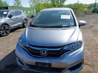 2019 Honda Fit LX with VIN 3HGGK5H44KM750452, listed as a IAAI auction lot 42129934 with 33,254 mi miles. Bid and sale history available at carsss.com. Image 12.