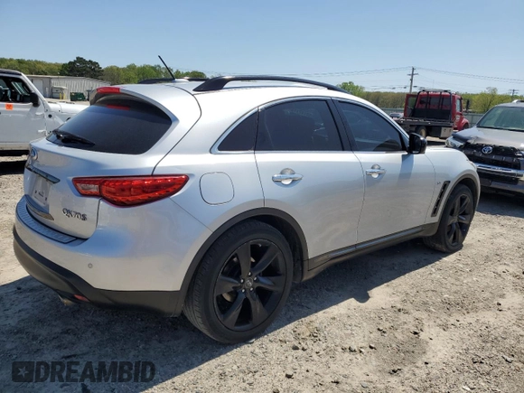 2016 Infiniti QX70 z VIN JN8CS1MWXGM752128, wystawiony jako Copart lot #52147115 z przebiegiem 122 637 mil mil oraz Tytuł czysty. Historia ofert i sprzedaży dostępna na DreamBid. Obrazek 3.