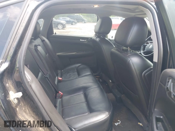 2014 Chevrolet Impala LTZ with VIN 2G1WC5E39E1103505, listed as a IAAI auction lot 42107207 with 216,544 mi miles and . Bid and sale history available at DreamBid. Image 8.