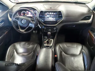 2015 Jeep Cherokee Trailhawk z VIN 1C4PJMBS8FW727992, wystawiony jako Copart lot #59799425 z przebiegiem 127 853 mil mil oraz Czysty tytuł • Clean title. Historia ofert i sprzedaży dostępna na DreamBid. Obrazek 8.