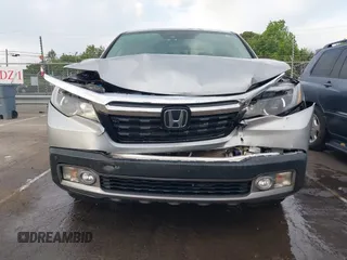2019 Honda Ridgeline RTL-E with VIN 5FPYK3F72KB026100, listed as a IAAI auction lot 42205910 with 78,359 mi miles and . Bid and sale history available at DreamBid. Image 12.