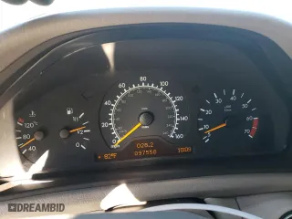 1999 Mercedes-Benz CLK-Class with VIN WDBLJ65G4XF071095, listed as a Copart auction lot 72080064 with 97,558 mi miles and Salvage Title. Bid and sale history available at carsss.com. Image 9.