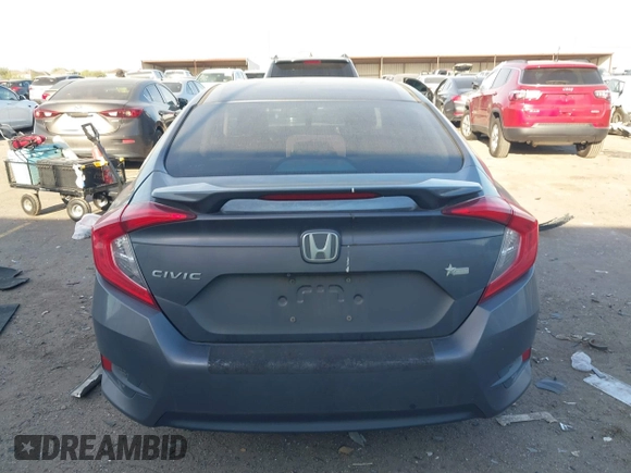 2016 Honda Civic Sedan EX with VIN 19XFC2F74GE064349, listed as a IAAI auction lot 41810683 with 129,817 mi miles. Bid and sale history available at carsss.com. Image 16.