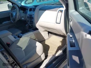 2010 Mercury Mariner with VIN 4M2CN9B75AKJ15058, listed as a IAAI auction lot 42042347 with 220,242 mi miles. Bid and sale history available at carsss.com. Image 5.