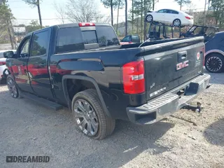 2015 GMC Sierra 1500 SLE with VIN 3GTU2UEC9FG338474, listed as a IAAI auction lot 41899379 with 140,859 mi miles. Bid and sale history available at carsss.com. Image 3.