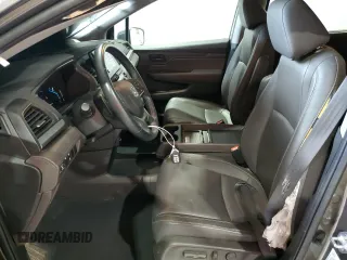 2022 Honda Odyssey EX-L z VIN 5FNRL6H71NB008541, wystawiony jako Copart lot #56850895 z przebiegiem 32 466 mil mil oraz Szkody całkowita. Historia ofert i sprzedaży dostępna na DreamBid. Obrazek 7.