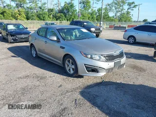 2014 Kia Optima LX with VIN KNAGM4A76E5493910, listed as a IAAI auction lot 42678057 with 221,481 mi miles and . Bid and sale history available at DreamBid. Image 1.