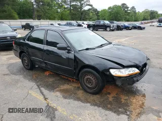 2001 Honda Accord LX z VIN 1HGCG66561A021253, wystawiony jako Copart lot #51798985 z przebiegiem Nie podano mil oraz Szkoda całkowita • Salvage title. Historia ofert i sprzedaży dostępna na DreamBid. Obrazek 4.