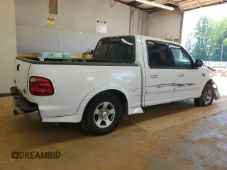2001 Ford F-150 XLT with VIN 1FTRW07W51KE03221, listed as a Copart auction lot 63628855 with 237,510 mi miles and Salvage title. Bid and sale history available at DreamBid. Image 3.