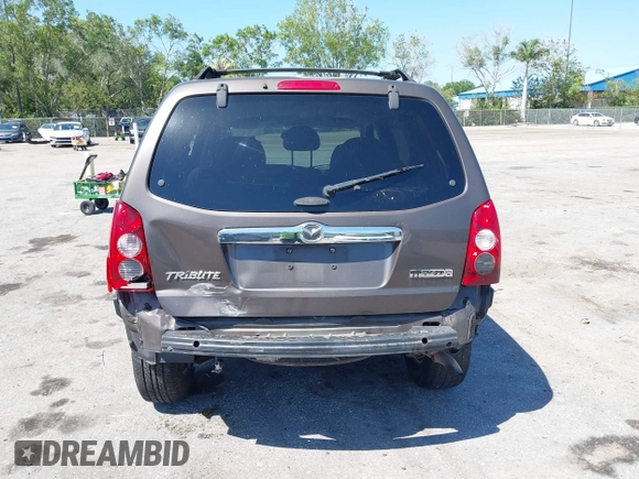 2006 Mazda Tribute i with VIN 4F2YZ02Z36KM29148, listed as a IAAI auction lot 42044163 with 175,786 mi miles and . Bid and sale history available at carsss.com. Image 16.