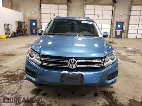 2017 Volkswagen Tiguan S z VIN WVGBV7AX4HK039281, wystawiony jako Copart lot #88013955 z przebiegiem 88 878 mil mil oraz Szkoda całkowita • Salvage title. Historia ofert i sprzedaży dostępna na DreamBid. Obrazek 5.