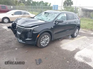2024 Cadillac XT4 AWD Premium Luxury с VIN 1GYFZDR44RF147956, выставлен на аукционе IAAI как лот 42434595 с пробегом 26 328 миль миль и . История ставок и продаж доступна на DreamBid. Изображение 2.