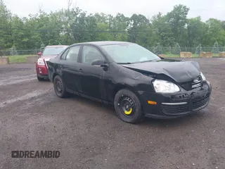 2009 Volkswagen Jetta S with VIN 3VWJM71K09M165670, listed as a IAAI auction lot 42308660 with 148,317 mi miles and . Bid and sale history available at DreamBid. Image 1.
