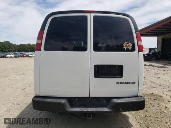2005 Chevrolet Express Cargo with VIN 1GCFG15T051142218, listed as a Copart auction lot 57409005 with 185,725 mi miles and Salvage title. Bid and sale history available at DreamBid. Image 6.