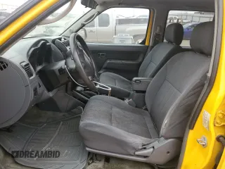 2002 Nissan Frontier XE with VIN 1N6ED29X72C389062, listed as a Copart auction lot 50712195 with 212,403 mi miles and Salvage title. Bid and sale history available at DreamBid. Image 7.