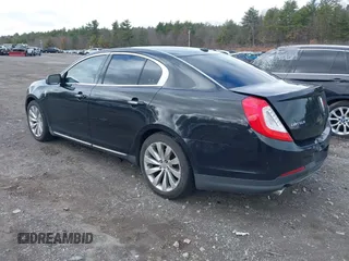 2014 Lincoln MKS with VIN 1LNHL9EK0EG601444, listed as a IAAI auction lot 41849160 with 164,791 mi miles. Bid and sale history available at carsss.com. Image 3.