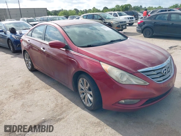 2012 Hyundai Sonata 2.4L Limited PZEV with VIN 5NPEC4AC4CH386426, listed as a IAAI auction lot 42036754 with 216,619 mi miles. Bid and sale history available at carsss.com. Image 1.