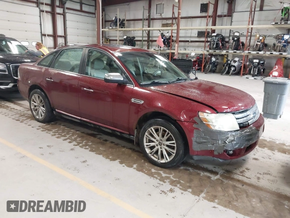 2008 Ford Taurus Limited with VIN 1FAHP28W28G153930, listed as a IAAI auction lot 42154827 with 243,386 mi miles. Bid and sale history available at carsss.com. Image 1.