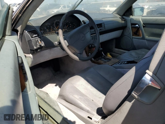 1992 Mercedes-Benz 500 z VIN WDBFA66E9NF050217, wystawiony jako Copart lot #58065965 z przebiegiem 143 456 mil mil oraz Tytuł czysty. Historia ofert i sprzedaży dostępna na DreamBid. Obrazek 8.