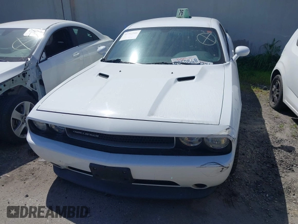 2013 Dodge Challenger SXT z VIN 2C3CDYAG8DH569468, wystawiony jako IAAI lot #41792206 z przebiegiem 161 439 mil mil oraz . Historia ofert i sprzedaży dostępna na DreamBid. Obrazek 12.