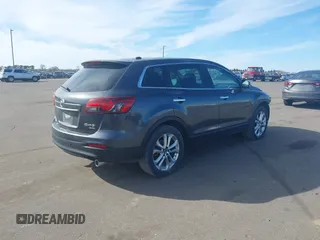 2013 Mazda CX-9 Grand Touring with VIN JM3TB3DA0D0412833, listed as a IAAI auction lot 41876447 with 173,830 mi miles and . Bid and sale history available at carsss.com. Image 4.
