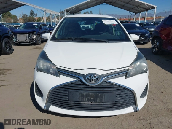 2015 Toyota Yaris L with VIN VNKKTUD34FA051863, listed as a IAAI auction lot 41615246 with 103,728 mi miles. Bid and sale history available at carsss.com. Image 12.