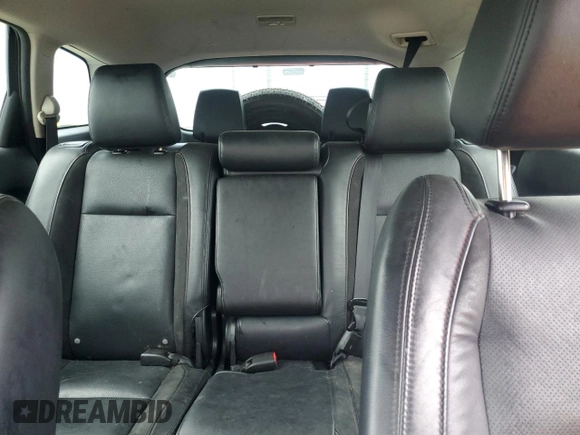 2014 Mazda CX-9 Touring z VIN JM3TB3CV2E0428585, wystawiony jako Copart lot #58067395 z przebiegiem 174 269 mil mil oraz Szkoda całkowita • Salvage title. Historia ofert i sprzedaży dostępna na DreamBid. Obrazek 10.