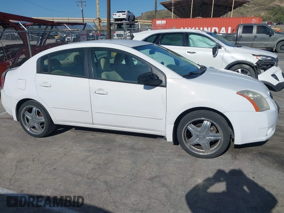 2008 Nissan Sentra S with VIN 3N1AB61EX8L739874, listed as a IAAI auction lot 41950310 with 129,485 mi miles and . Bid and sale history available at DreamBid. Image 14.