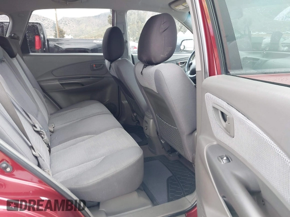 2006 Hyundai Tucson GL with VIN KM8JM12BX6U431424, listed as a IAAI auction lot 41769787 with 125,218 mi miles. Bid and sale history available at carsss.com. Image 8.