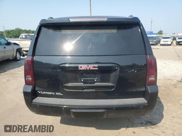 2015 GMC Yukon XL SLE z VIN 1GKS2GKC1FR278689, wystawiony jako Copart lot #59979435 z przebiegiem 123 681 mil mil oraz Czysty tytuł • Clean title. Historia ofert i sprzedaży dostępna na DreamBid. Obrazek 6.