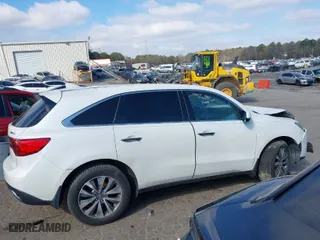 2016 Acura MDX w/Tech with VIN 5FRYD3H4XGB015163, listed as a IAAI auction lot 41635045 with 189,000 mi miles. Bid and sale history available at carsss.com. Image 13.